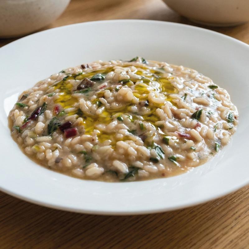 Risotto mit Radicchio, roten Rübenblättern und Bruscandoli